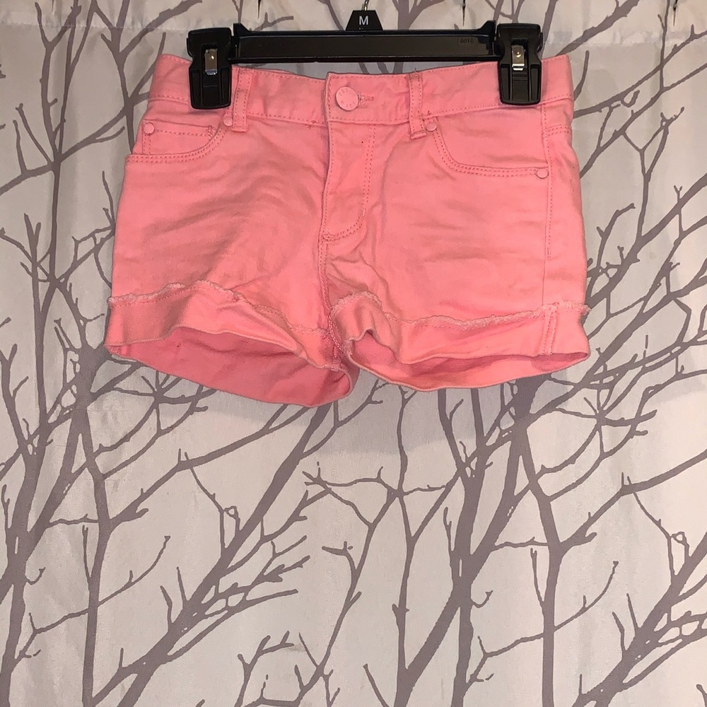 Girls skirt and a pair of shorts(you get both)